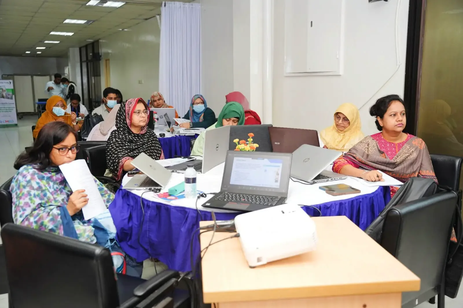 Doctors and clinical professionals with training certificates at OGSB Hospital