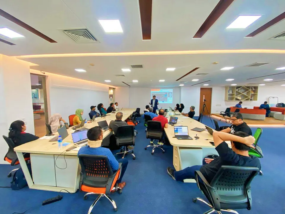 Participants collaborating at an AI Forum Bangladesh event